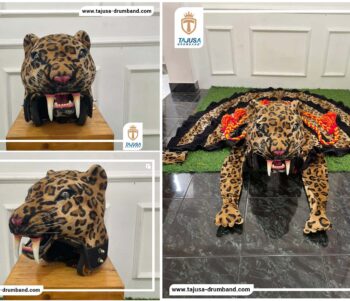 Maskot Smilodon